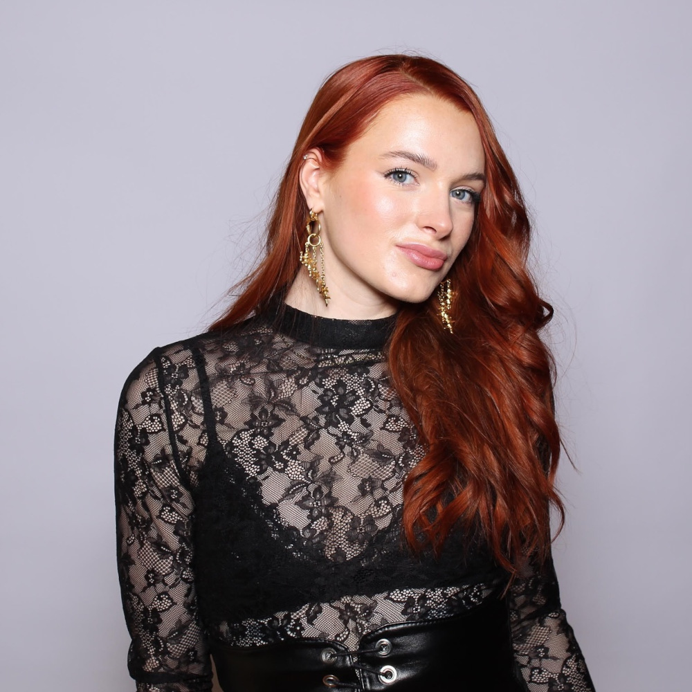 portrait of woman on tripod-style photo booth